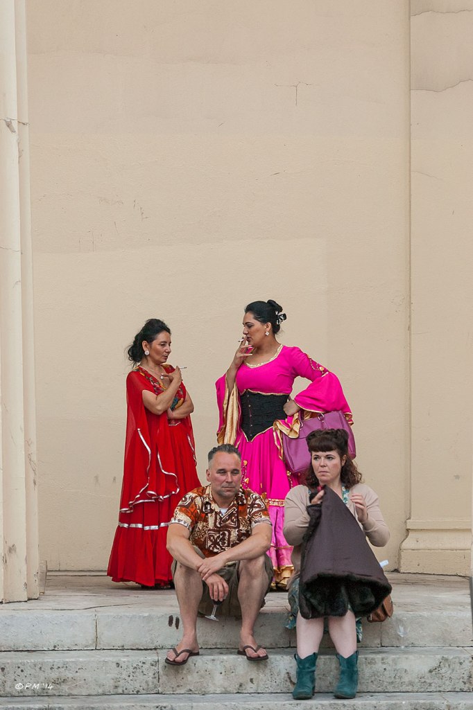 Gypsy Dancers in bright costumes smoking outside concert at Brighton Unitarian church 2014 eyeteeth.net