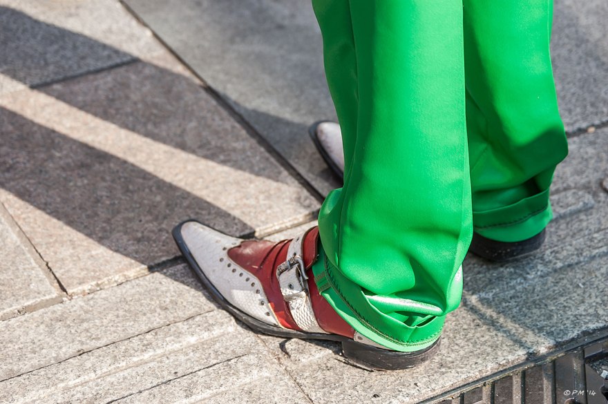 Close up of a mans feet in red and white snake skin winkle picker shoes and green trousers, Brighton street photography UK 2014 eyeteeth.net 