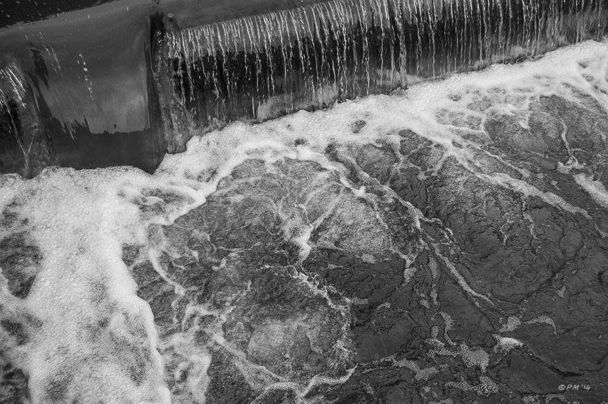 Water flowing over weir on River Ouse Barkham Mills East Sussex UK. Abstract Monochrome. P.Maton 2014 eyeteeth.net