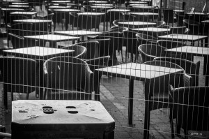 Bin with tables and chairs outside bar on Brighton seafront. Monochrome abstract. Brighton East Sussex UK. P.Maton 2014 eyeteeth.net