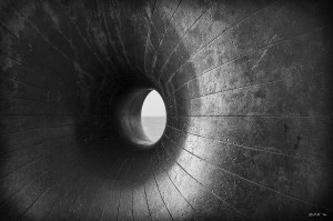 "Doughnut' sculpture 'Afloat' by Hamish Black with horizon visible through hole. Monochrome abstract. Brighton East Sussex UK. P.Maton 2014 eyeteeth.net