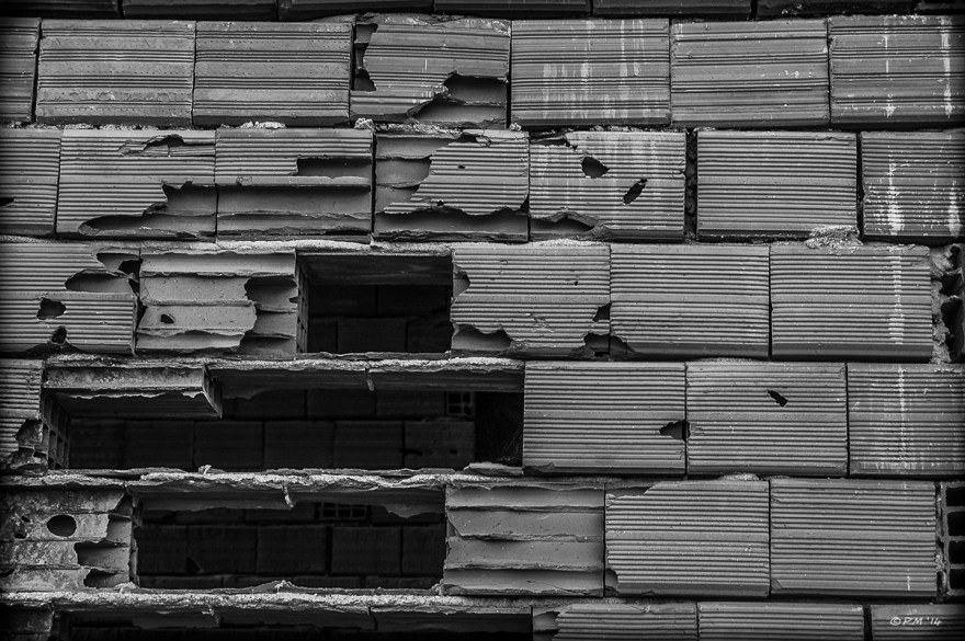 Hollow brick wall with smashed section looking through to empty space. Monochrome abstract landscape. Patara, Turkey. P.Maton 2014 eyeteeth.net