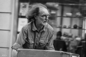 Delivery man with box. Monochrome landscape. Gardener Street, Brighton, UK © P.Maton 2014 eyeteeth.net