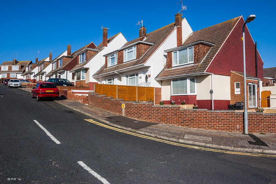 Suburban housing estate Heathfield Crescent Mile Oak Sussex, blue sky. Colour Landscape. © P. Maton 2014 eyeteeth.net