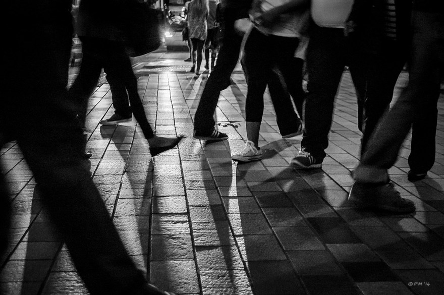 Legs of people walking in front of car headlamps. Abstract Monochrome Landscape. © P. Maton 2014 eyeteeth,net