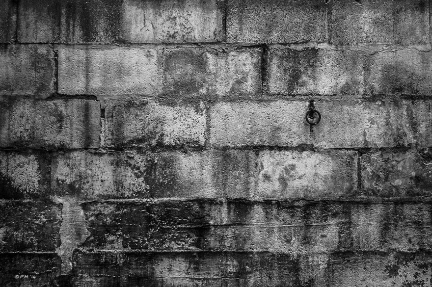 Iron ring hanging on decayed wall in abandoned stable. Ford Lane, Frilford Oxfordshire UK. Monochrome Landscape. © P. Maton 2014 eyeteeth.net