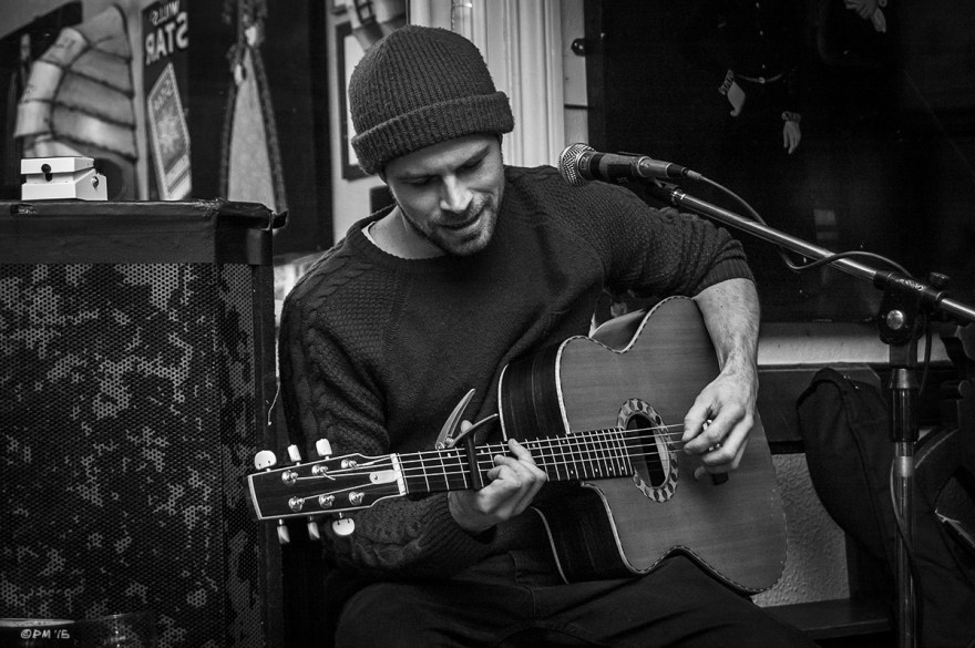 Luke Day Folk Singer at the Shakespeare's Head Pub Brighton UK. Monochrome Landscape. © P. Maton 2015 eyeteeth.net