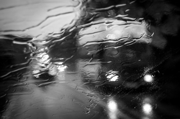 Traffic with headlights through rain washed windscreen. Sussex UK. Monochrome Landscape. © P. Maton 2015 eyeteeth.net