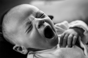 Two week old baby boy yawning, portrait close-up black and white infant in natural light © P. Maton 2017 eyeteeth.net